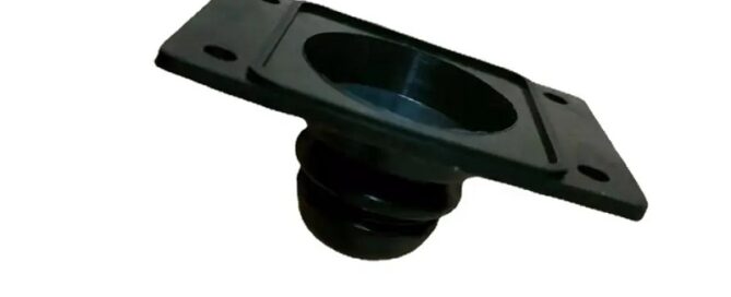 Rubber circular fan outlets cover the spring shaft coupling for the door