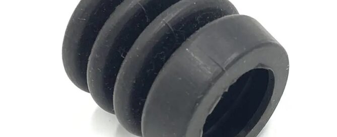 Rubber circular fan outlets cover the spring shaft coupling for the door